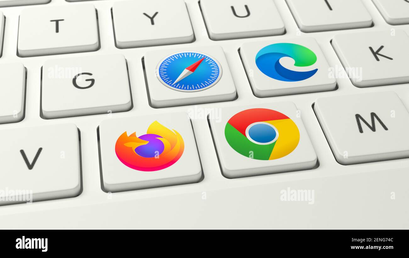 Battle of the browsers concept: Logos of the main browser apps Mozilla Firefox, Apple Safari. Google Chrome and Microsoft Edge (l.t.r.) as keys on a k Stock Photo