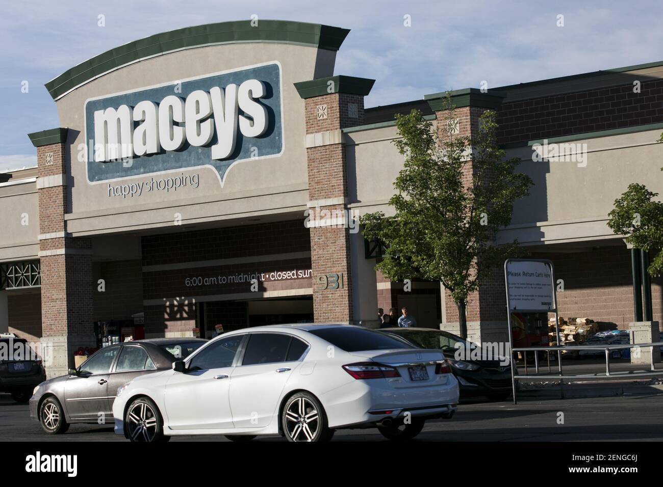 A logo sign outside of a Macey's retail grocery store location in