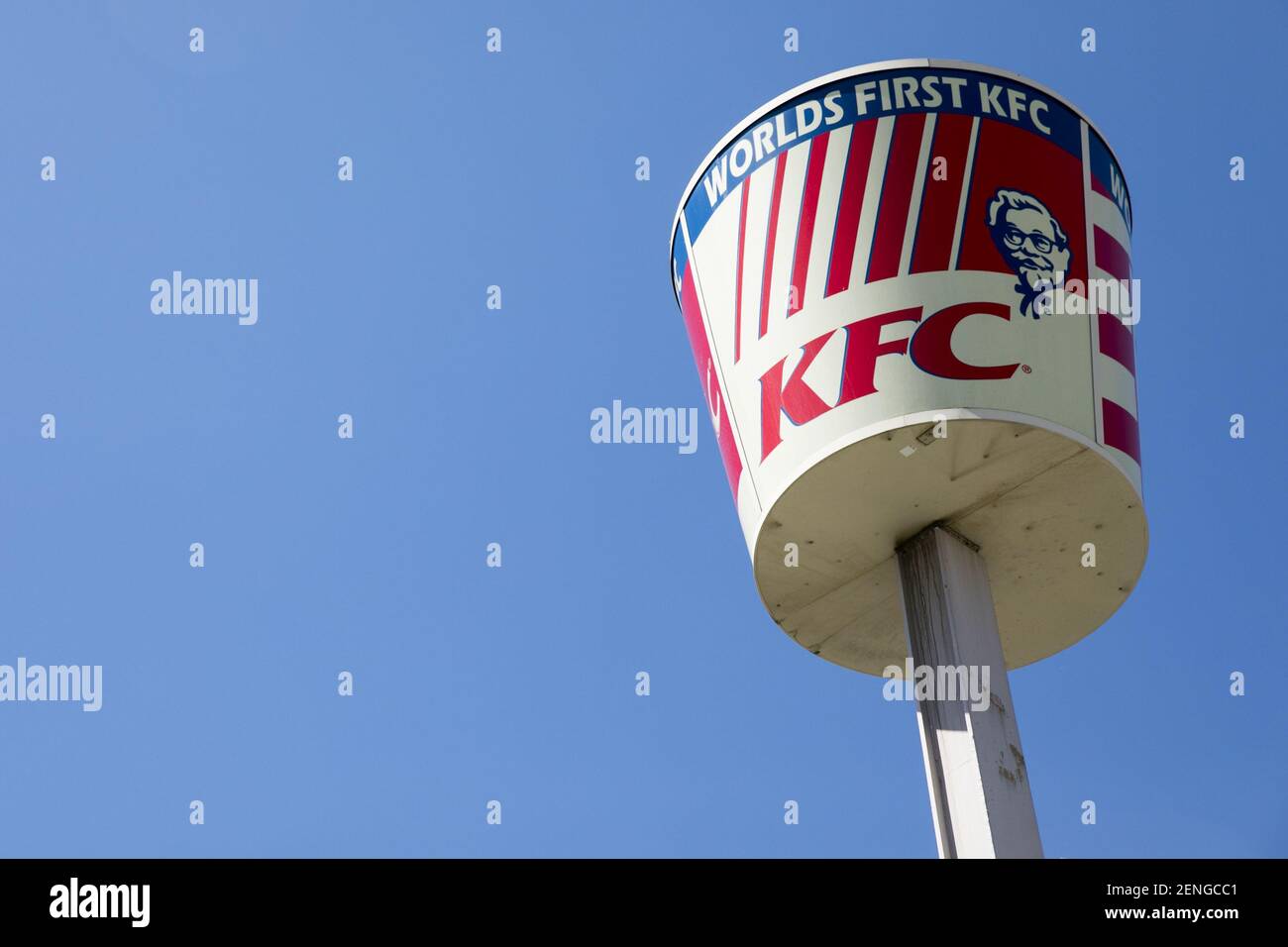 A logo sign outside of the first Kentucky Fried Chicken (KFC) franchise