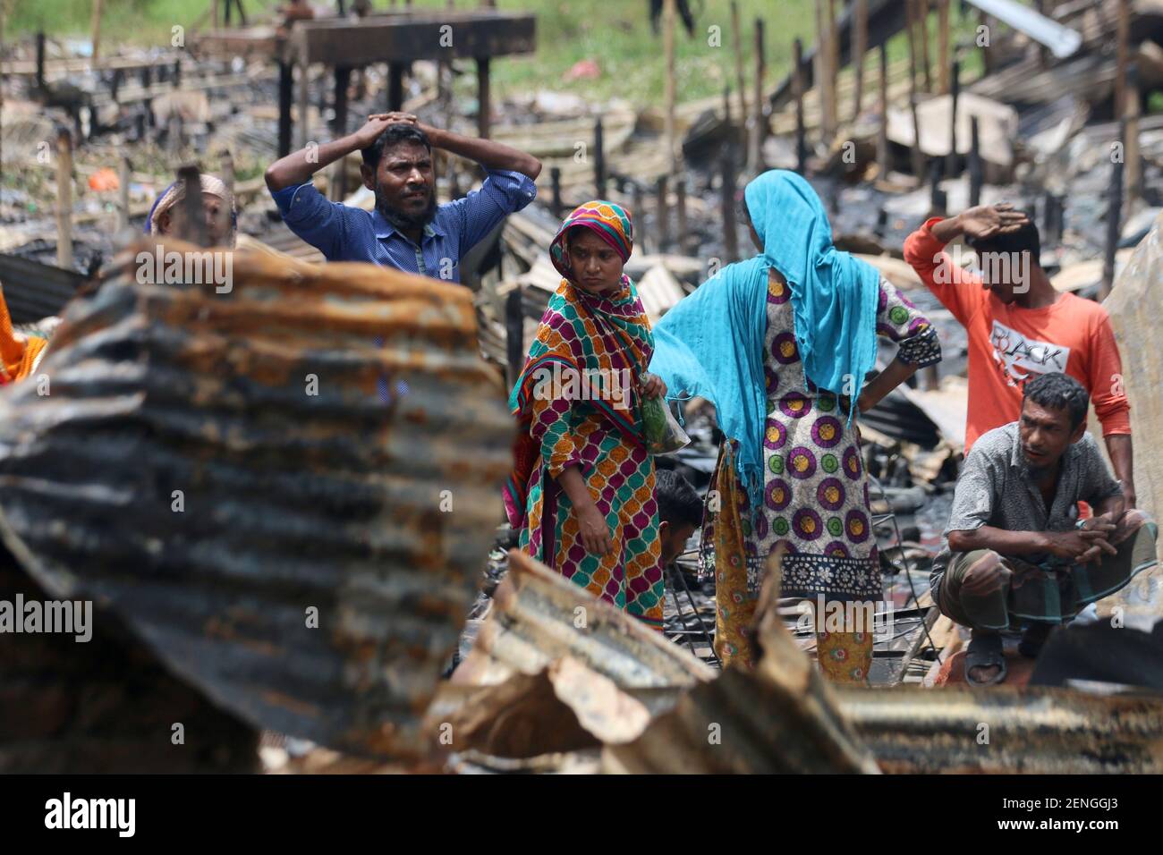 Dwellers at the fire devastated slum in Mirpur area of Dhaka. 3,000 ...