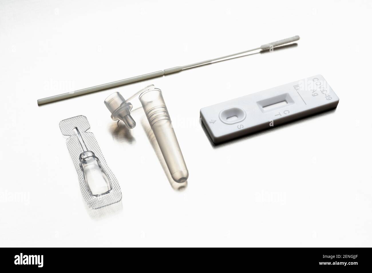 All parts of sarscov2 rapid antigen test kit on stainless steel