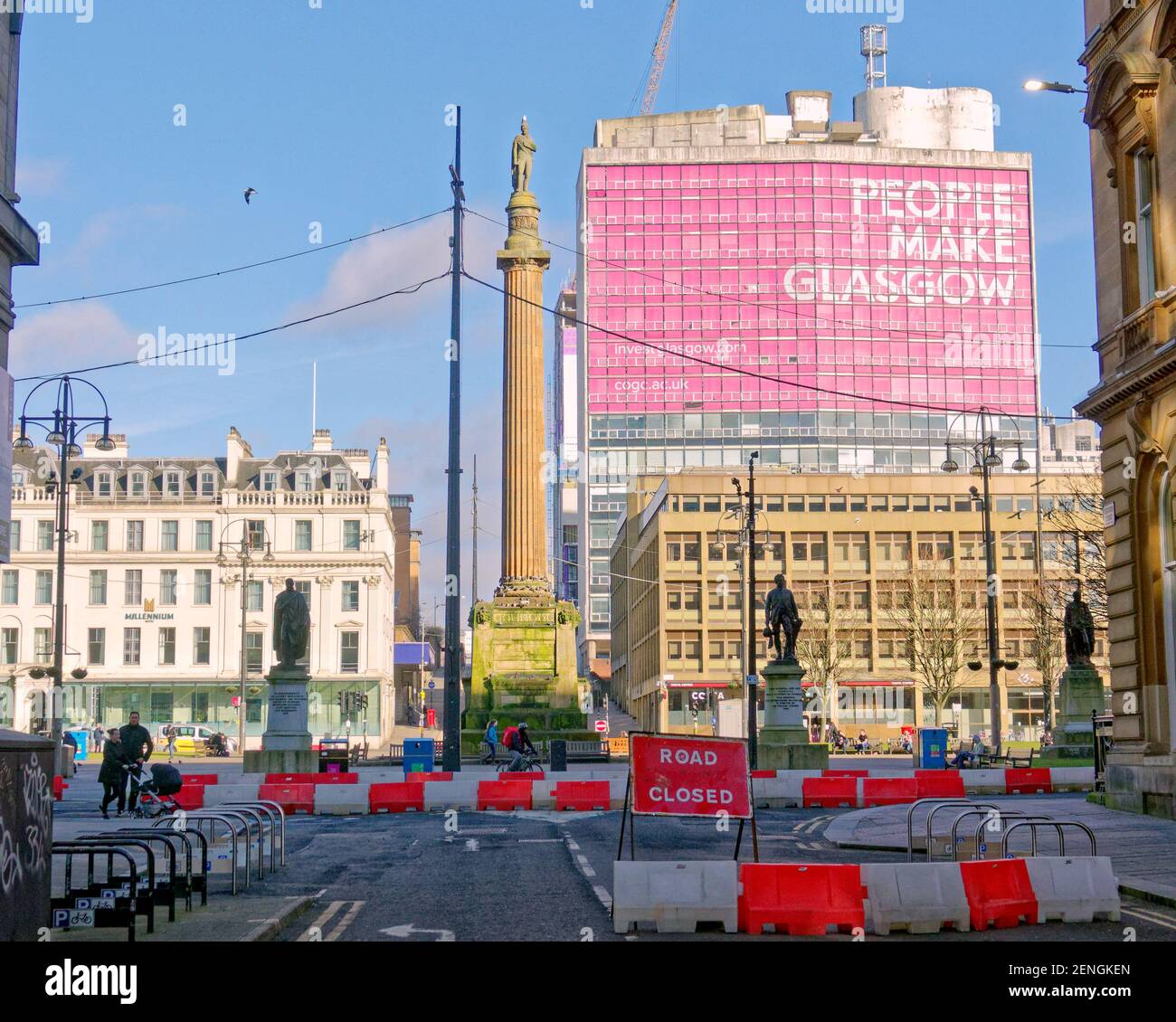 Glasgow, Scotland, UK, 26th February, 2021, Lockdown Friday saw sunny weather as people continue to wander alone aimless in the empty city centre..Rooadworks are stiill infesting the city centre around george square combine with road closure ahead of rerouting the city centre.  Credit Gerard Ferry/Alamy Live News Stock Photo