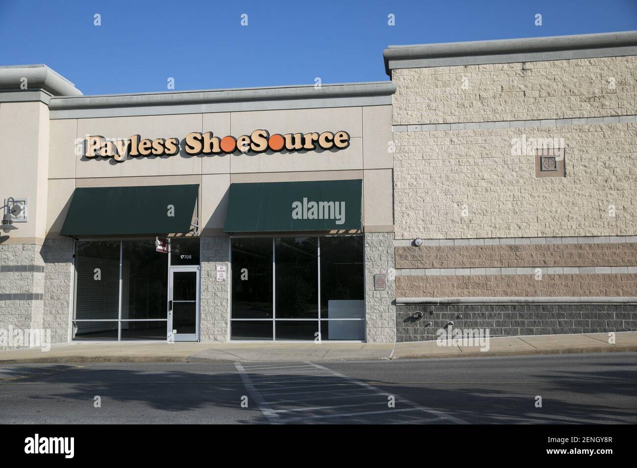 A logo sign outside of an abandoned Payless ShoeSource retail store location in Hagerstown