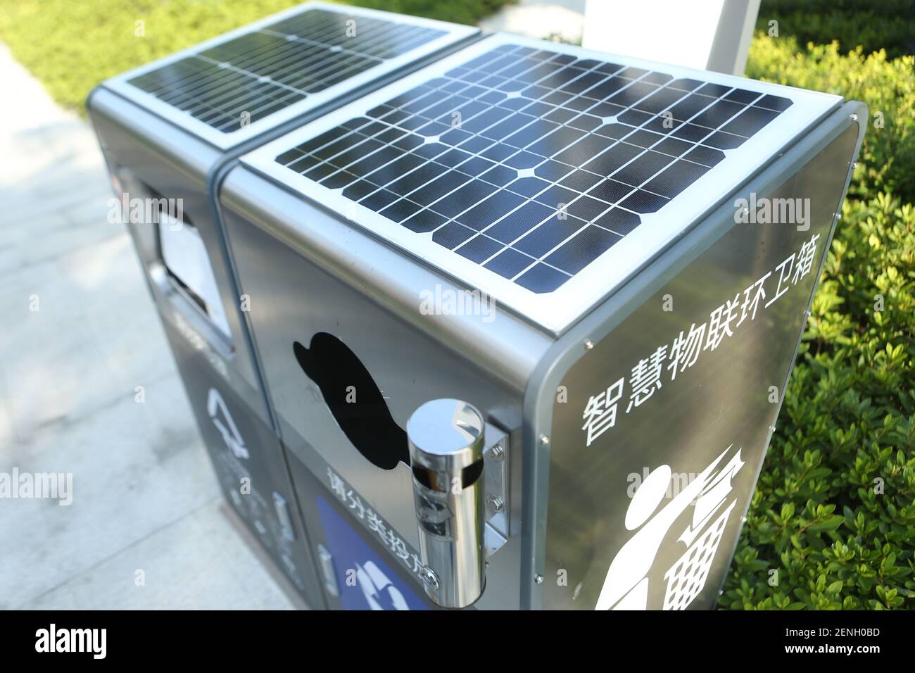 An artificial intelligence (AI) garbage sorting bin is displayed at
