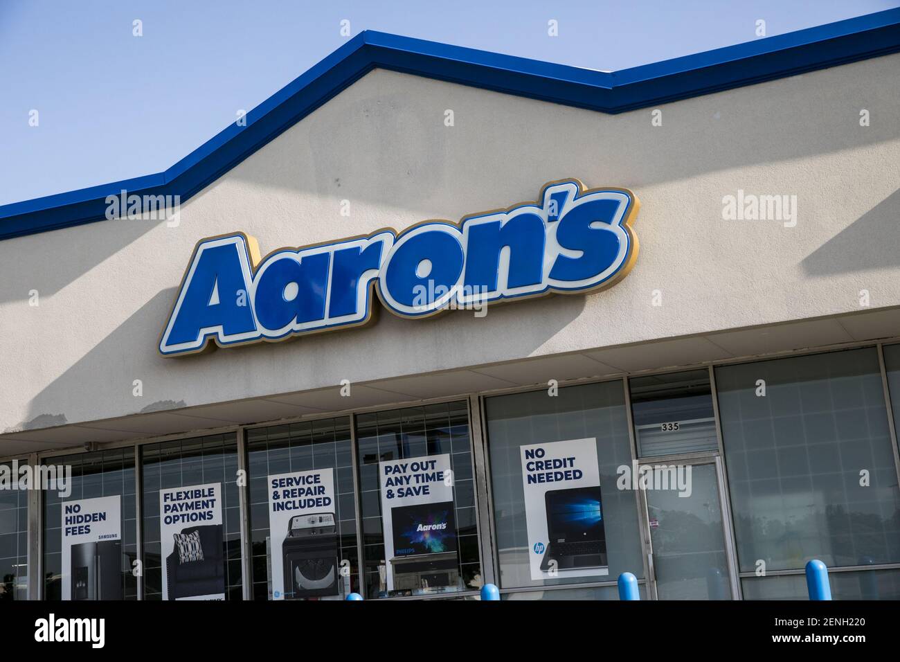 A logo sign outside of a Aaron's, Inc., retail store location in Elyria ...