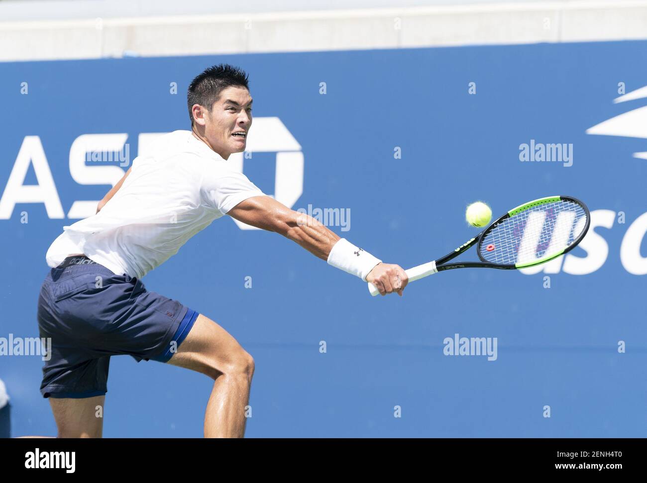 Thai-Son Kwiatkowski (USA) returns ball during qualifying round 1 of US  Open Tennis Championship against Mikael Ymer (Sweden) at Billie Jean King  National Tennis Center in New York, NY on August 19,