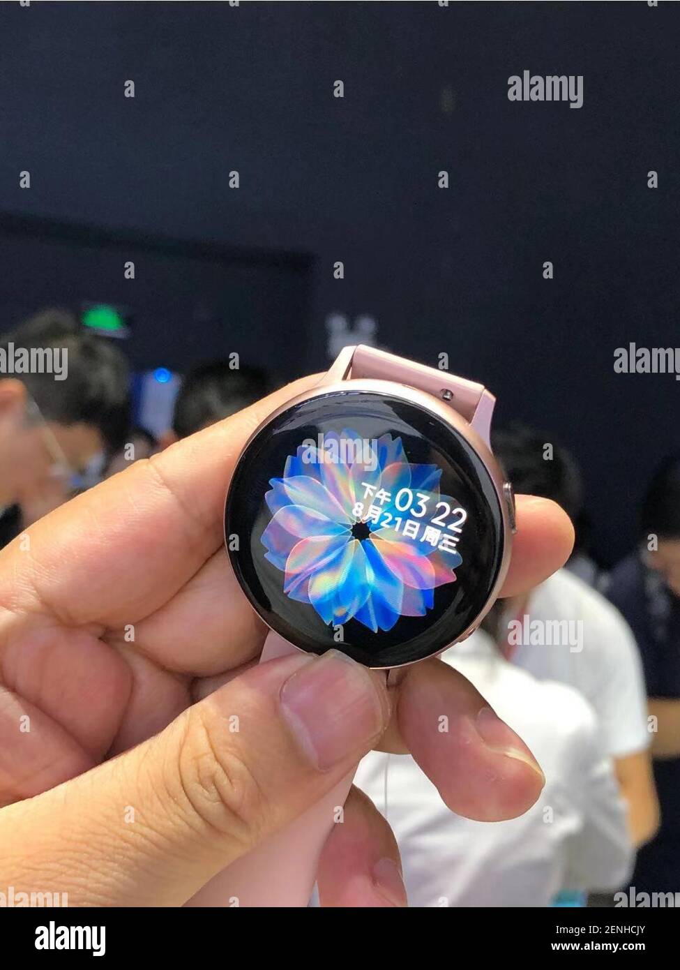 A visitor tries out a Samsung Galaxy Watch Active 2 smartwatch during a new product event in Beijing, China, 21 August 2019. Preorders for Samsung's newest smartwatch started for $279. Samsung