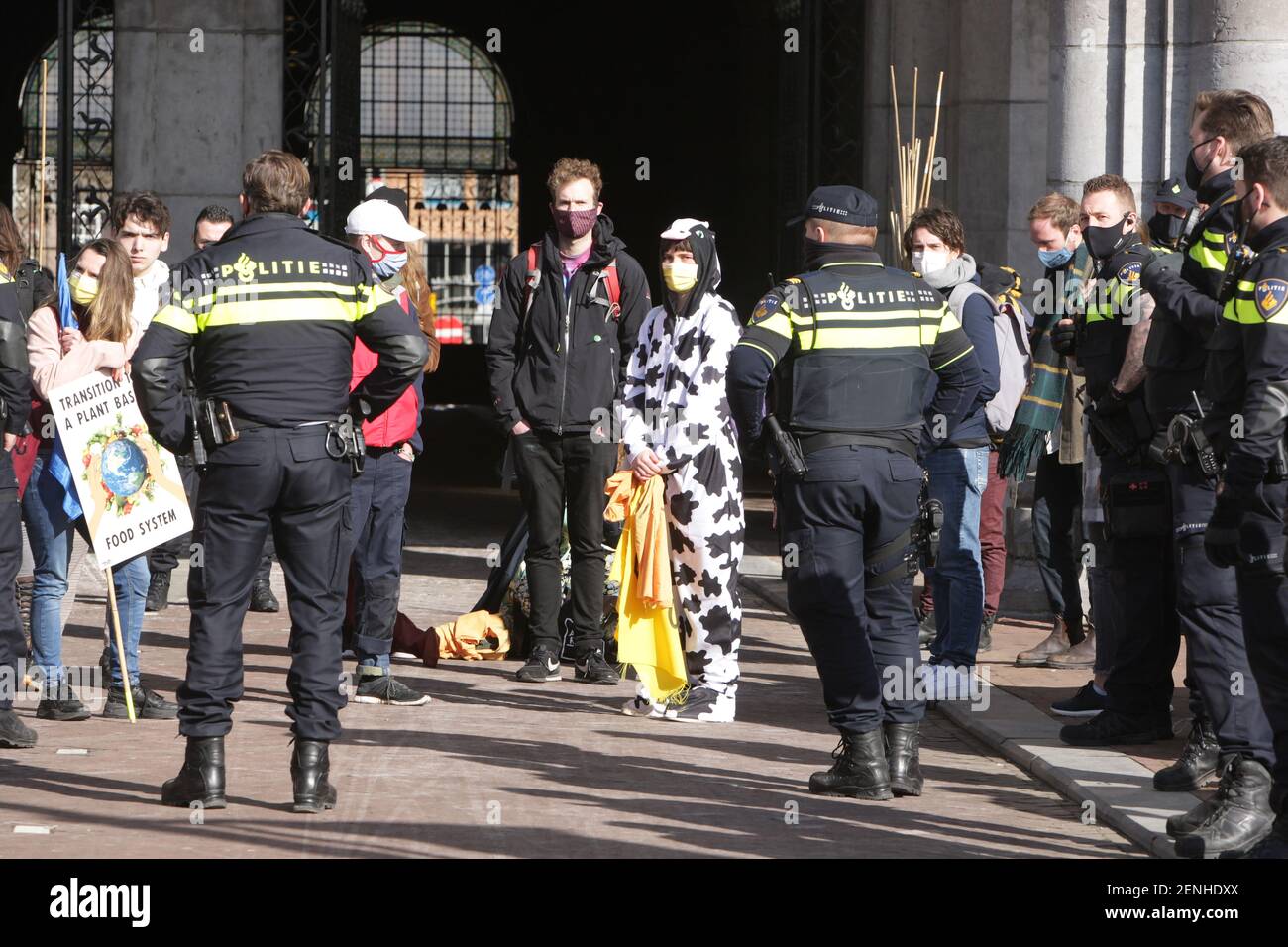 Extinction Rebellion environmental activistsis are detained by Dutch police officers during protest block the main entrance of the Rijksmuseum on February 26, 2021 in Amsterdam,Netherlands. Environmental protectors of Extinction Rebellion make a demonstration against the lobby of the large companies their influence on politics, climate and ecological crisis and this consequences and demand a citizens assembly for a just climate policy. (Photo by Paulo Amorim/Sipa USA) Stock Photo
