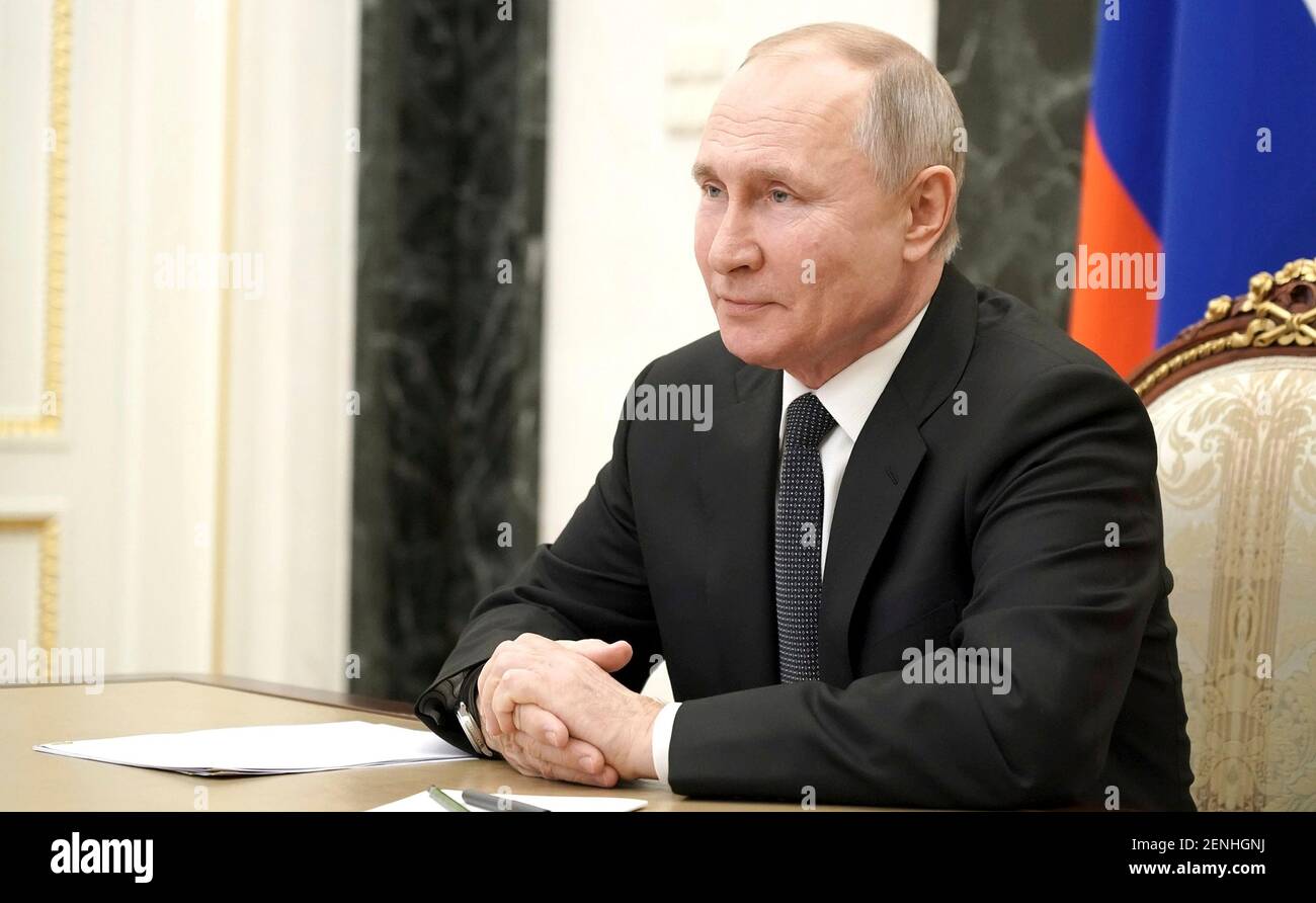 Moscow, Russia. 26th Feb, 2021. Russian President Vladimir Putin, chairs a video conference with permanent members of the Security Council from the Kremlin February 26, 2021 in Moscow, Russia. Putin called the meeting to discuss the situation around the Nagorno Karabakh peace settlement. Credit: Planetpix/Alamy Live News Stock Photo