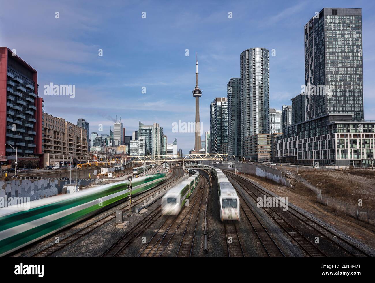 Three commuter trains passing each other in downtown Toronto Stock Photo