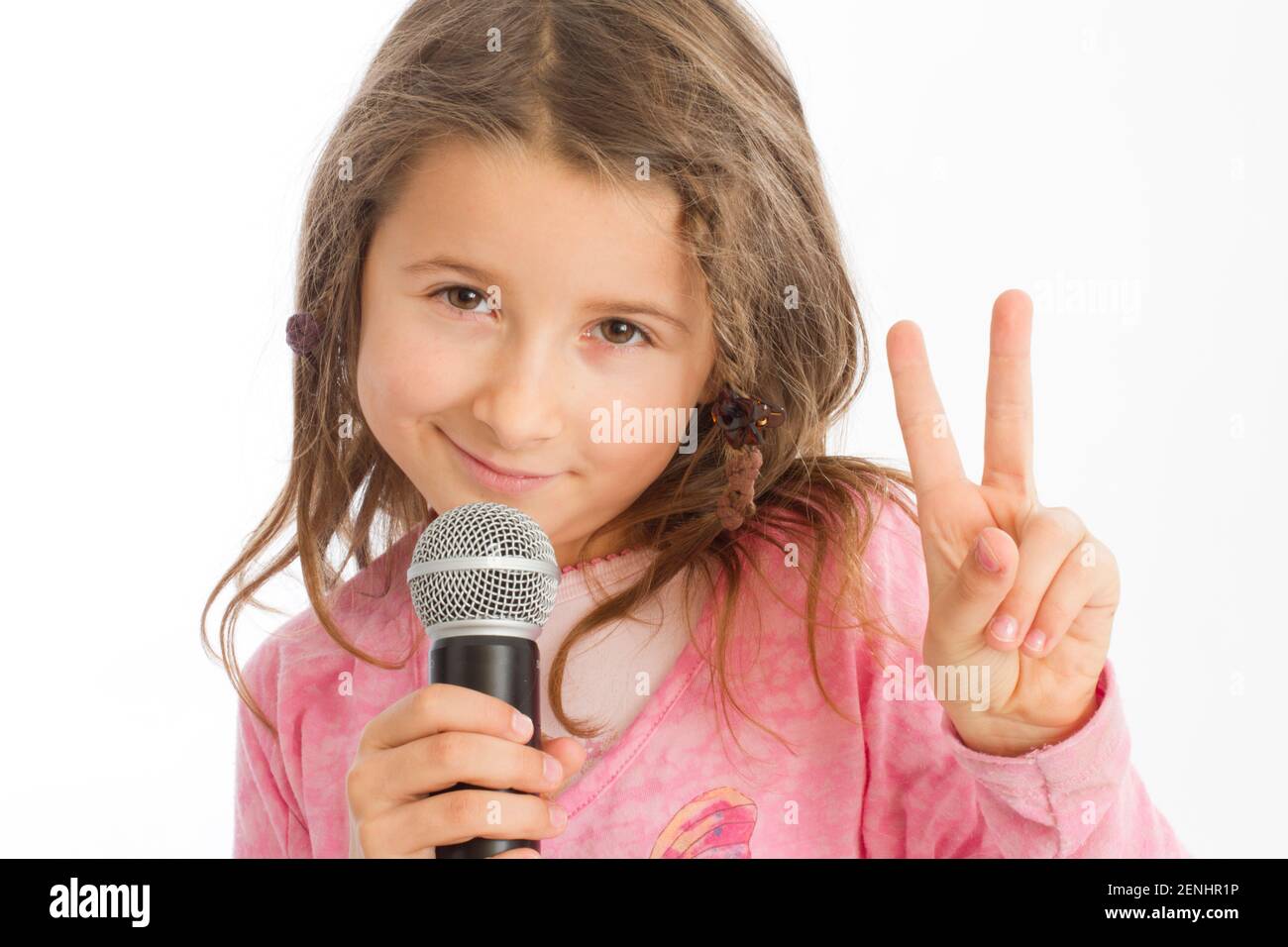 Blondes Maedchen, 7 Jahre, sint, Karaoke, Mikrophon, MR: YES Stock Photo
