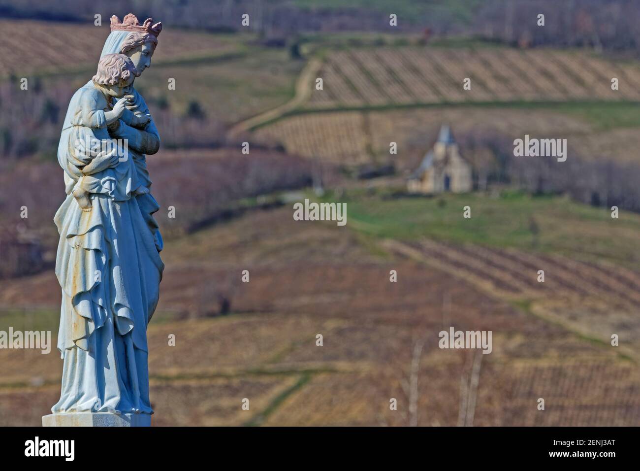 A Virgin-Mary statue looks after the fields over the Beaujolais vineyards Stock Photo