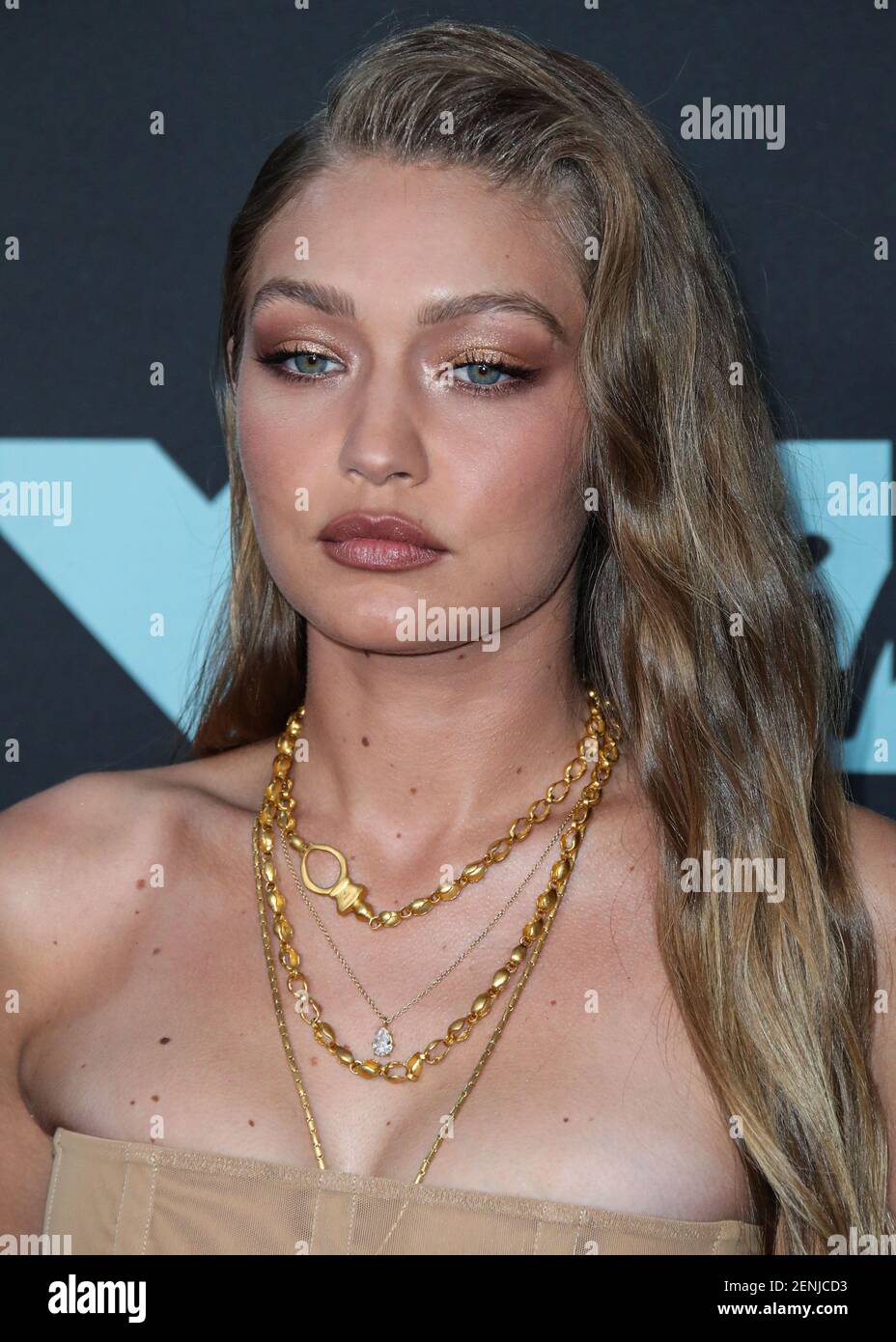 NEWARK, NEW JERSEY, USA - AUGUST 26: Model Gigi Hadid wearing head-to-toe Tom  Ford with Eli Halil jewelry arrives at the 2019 MTV Video Music Awards held  at the Prudential Center on