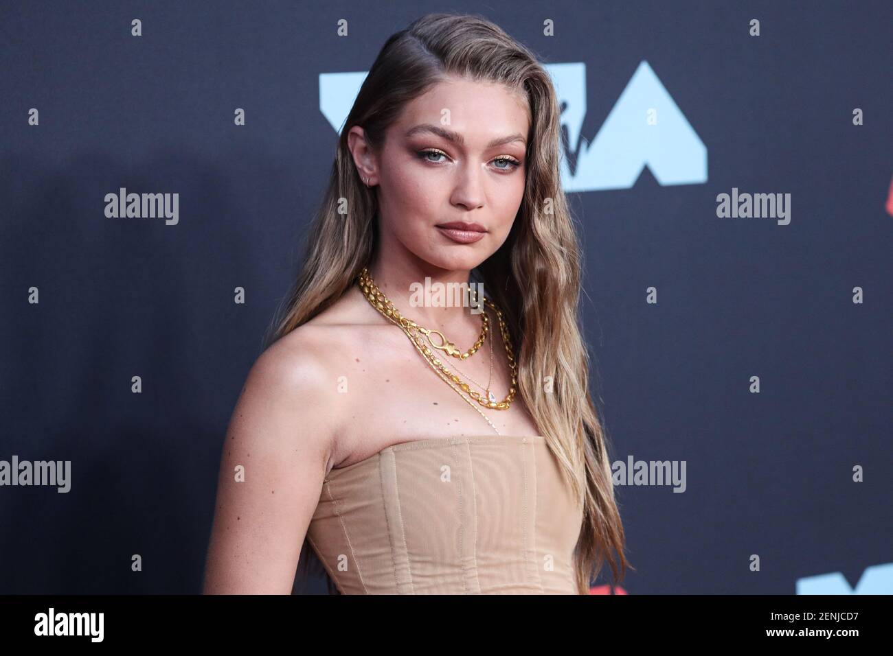 NEWARK, NEW JERSEY, USA - AUGUST 26: Model Gigi Hadid wearing head-to-toe Tom  Ford with Eli Halil jewelry arrives at the 2019 MTV Video Music Awards held  at the Prudential Center on