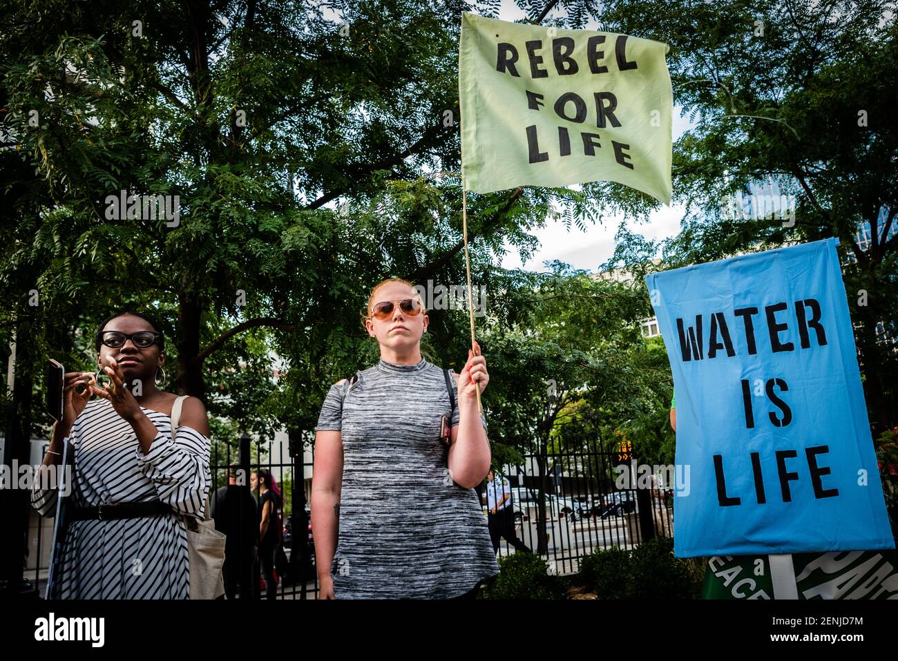 Clean water activists gathered outside the Prudential Center on Monday ...