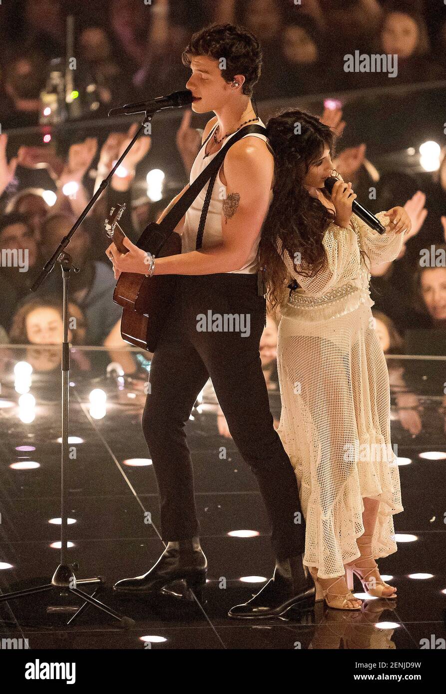 NEWARK, NJ AUGUST 26 Shawn Mendes and Camila Cabello perform on the