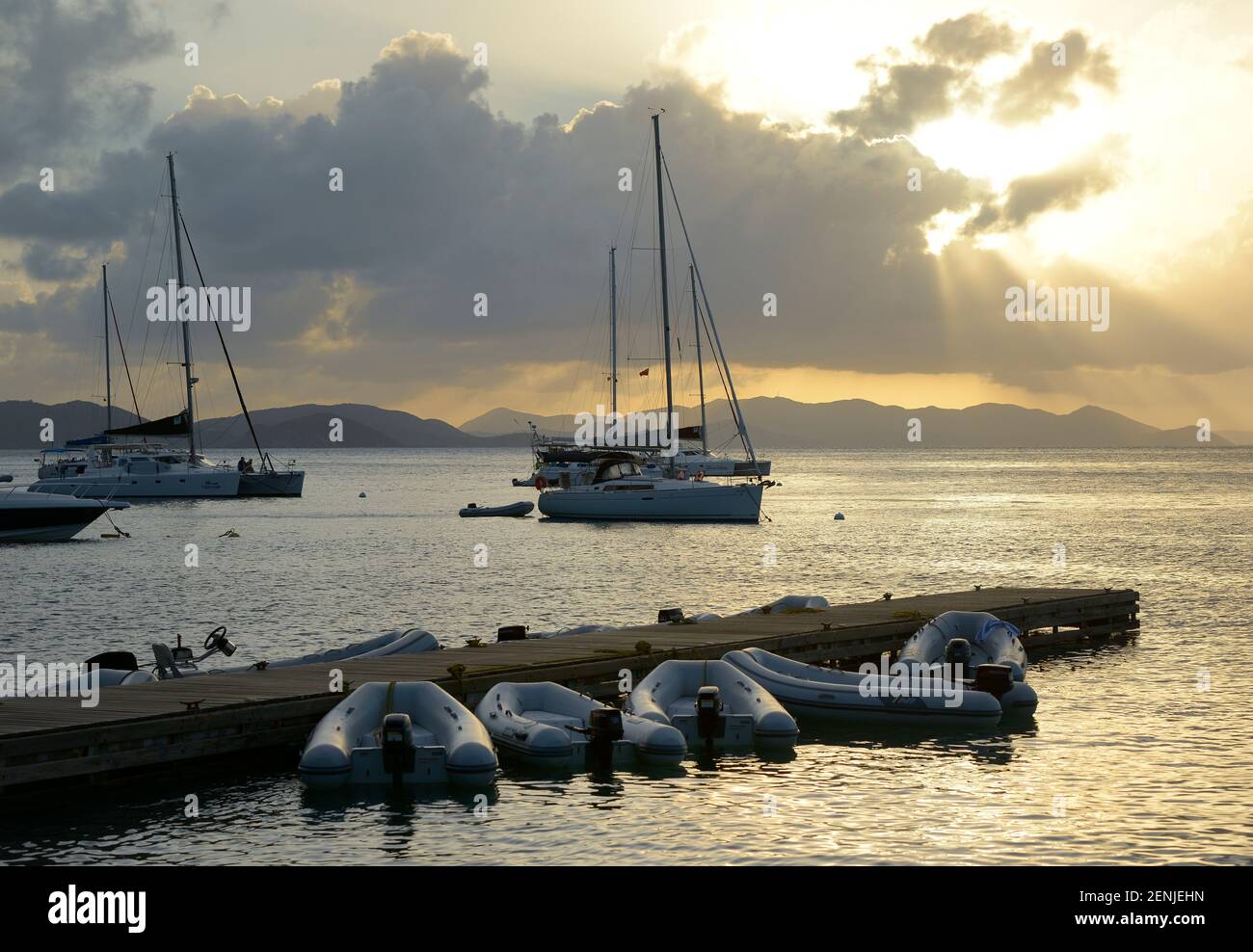 Dinghies and sailboats at sunset, Manchioneel Bay, Cooper Island Beach