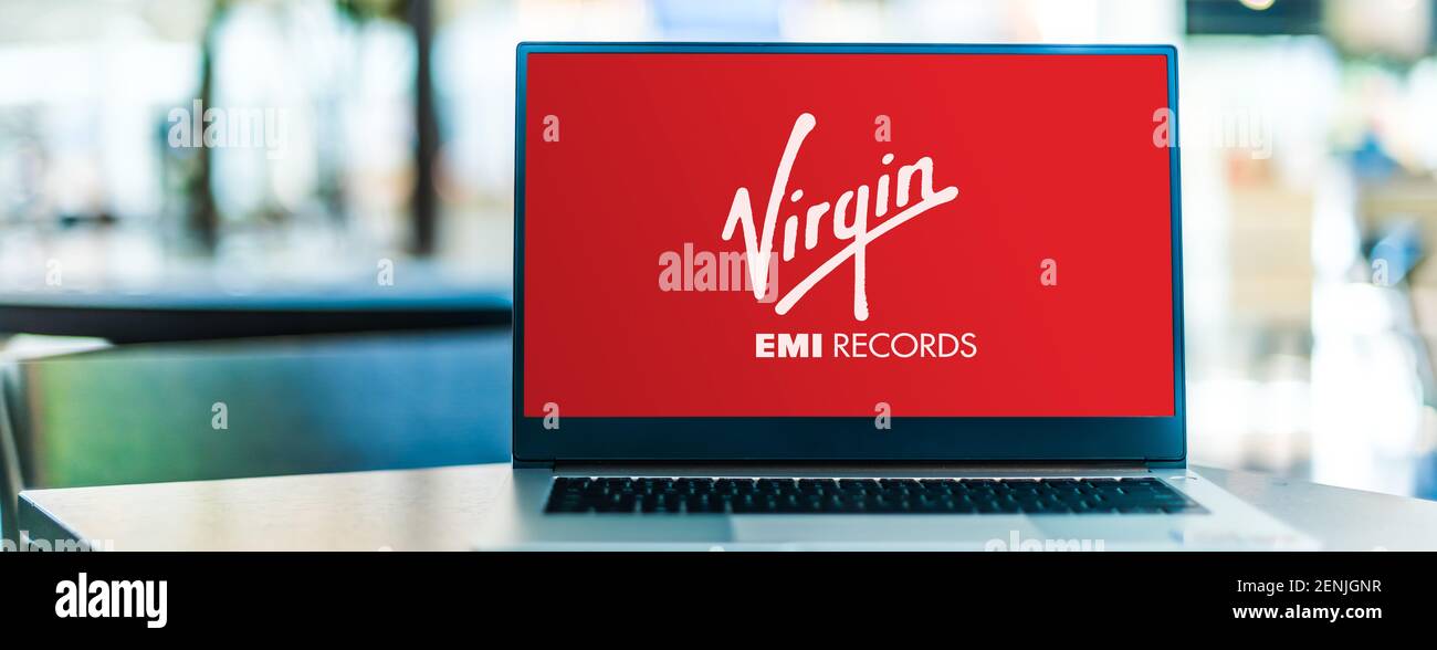 POZNAN, POL - JAN 6, 2021: Laptop computer displaying logo of Virgin Group, a British multinational venture capital conglomerate Stock Photo