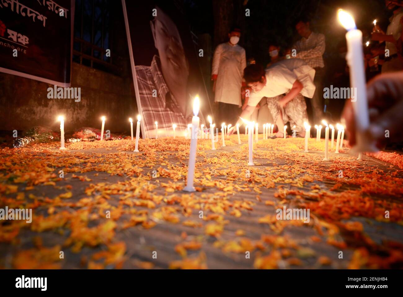 Dhaka, Bangladesh - February 26, 2021: People gather in Dhaka to lighting a candle remembering the murder of the Bangladeshi American blogger, writer Stock Photo