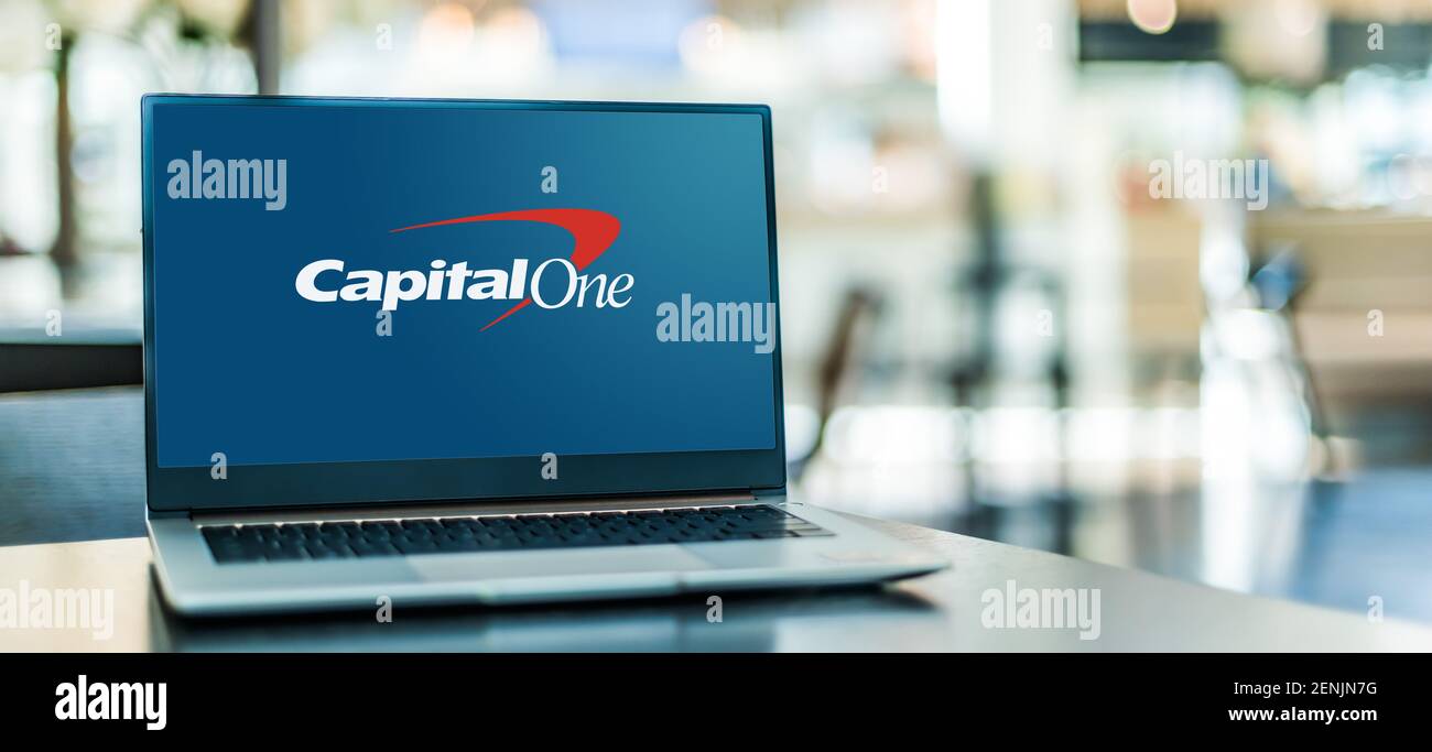 POZNAN, POL - JAN 6, 2021: Laptop computer displaying logo of Capital One Financial Corporation, a bank holding company specializing in credit cards, Stock Photo