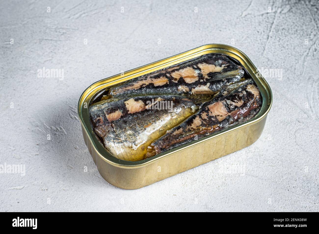 Open can with sardine in olive oil. White background. Top view Stock Photo  - Alamy