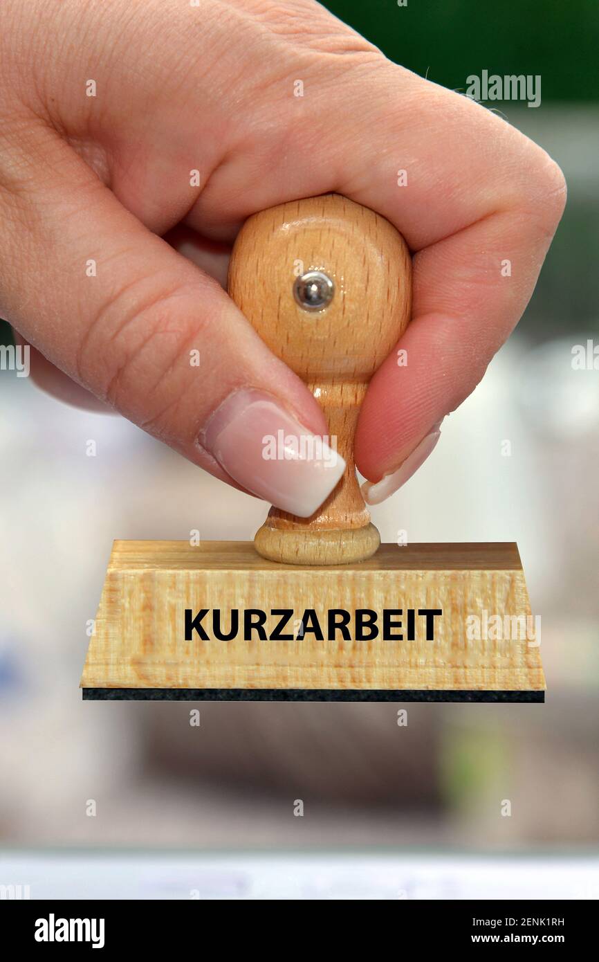 Stempel, Holzstempel, Aufschrift: Kurzarbeit Stock Photo
