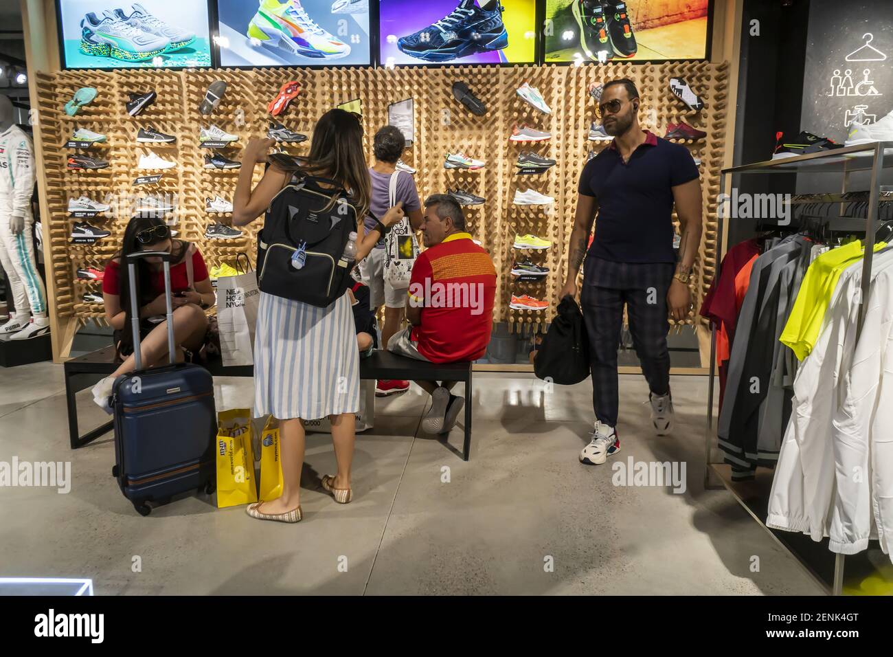 Shoppers and visitors flock to the newly opened Puma flagship store on  Fifth Avenue in New York on Thursday, August 29, 2019. The 18,000 square  foot, two level store is Pumaâ€™s first