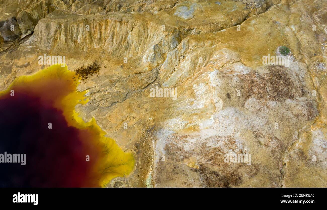 Aerial view of abandoned opencast copper mine in Sia, Cyprus. Unusual colors derives from massive sulfide deposits in the area Stock Photo