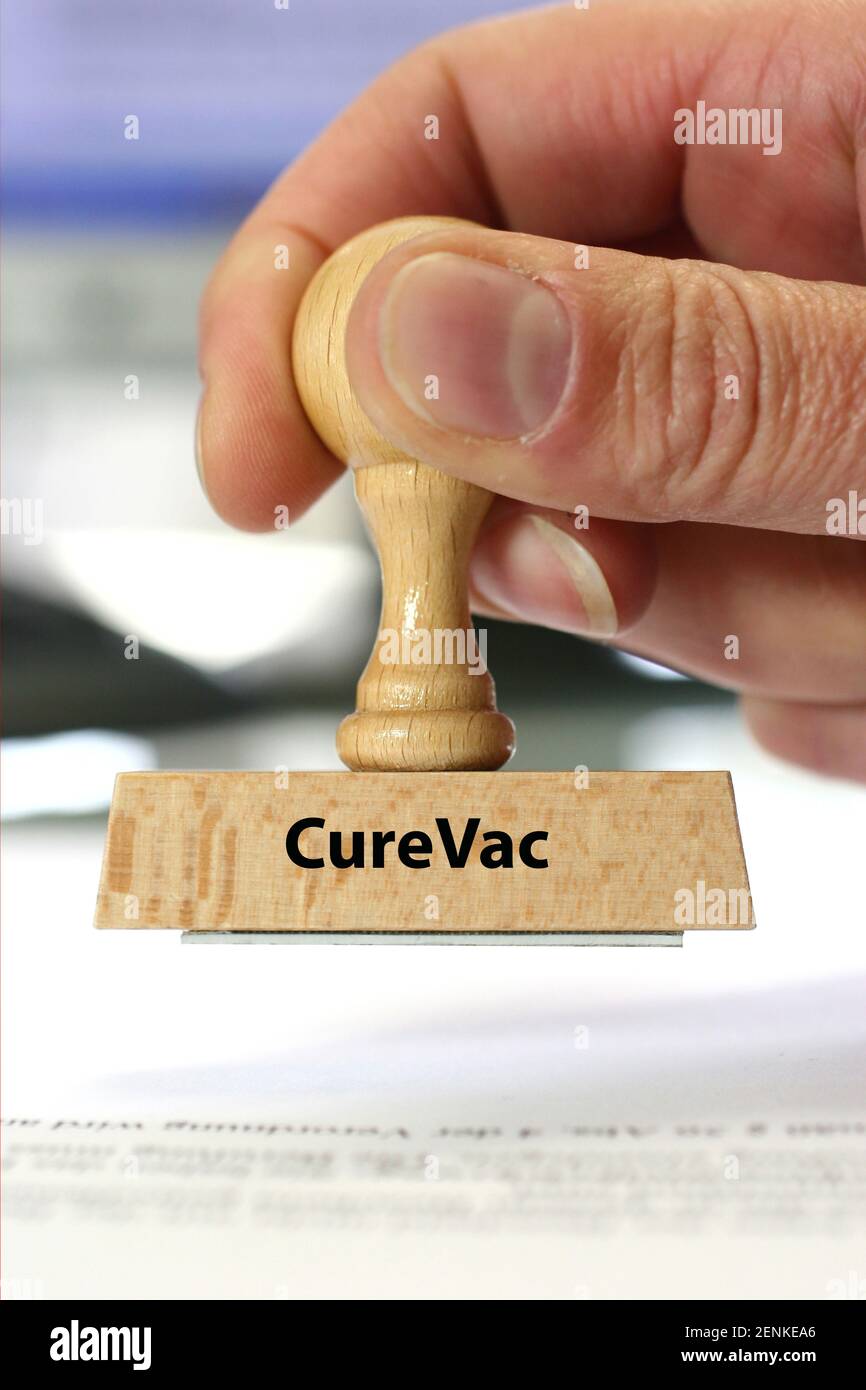 Stempel, Holzstempel, Aufschrift: CureVac, Impfstoffhersteller, Pharmaunternehmen, Covid-19 Impfstoff, Forschung, mRNA-Impfstoff,  mRNA, Stock Photo