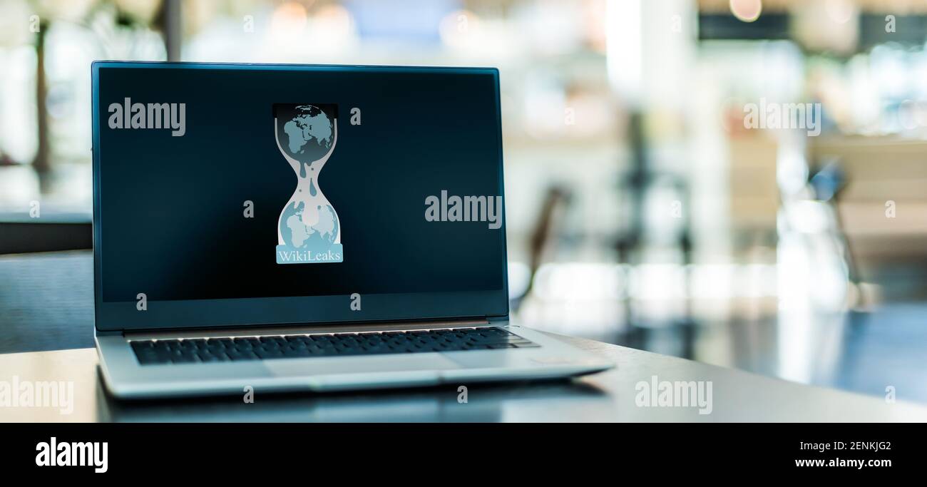 POZNAN, POL - JAN 6, 2021: Laptop computer displaying logo of WikiLeaks, an international non-profit organisation that publishes news leaks and classi Stock Photo