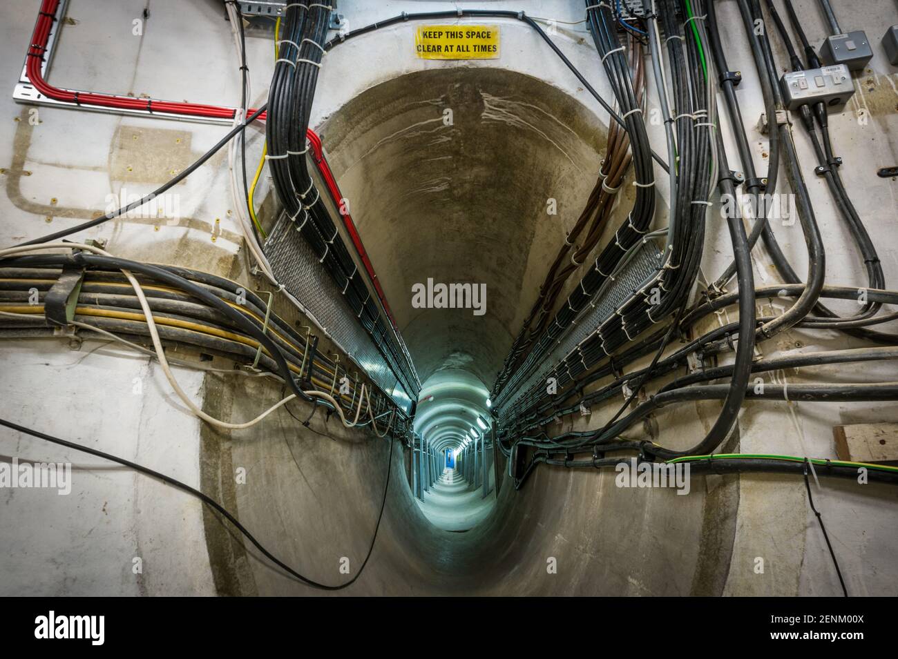 Cables entering the tunnel beneath the 25m antenna at the Science and Technology Facilities Council's Chilbolton Observatory, Hampshire. Stock Photo