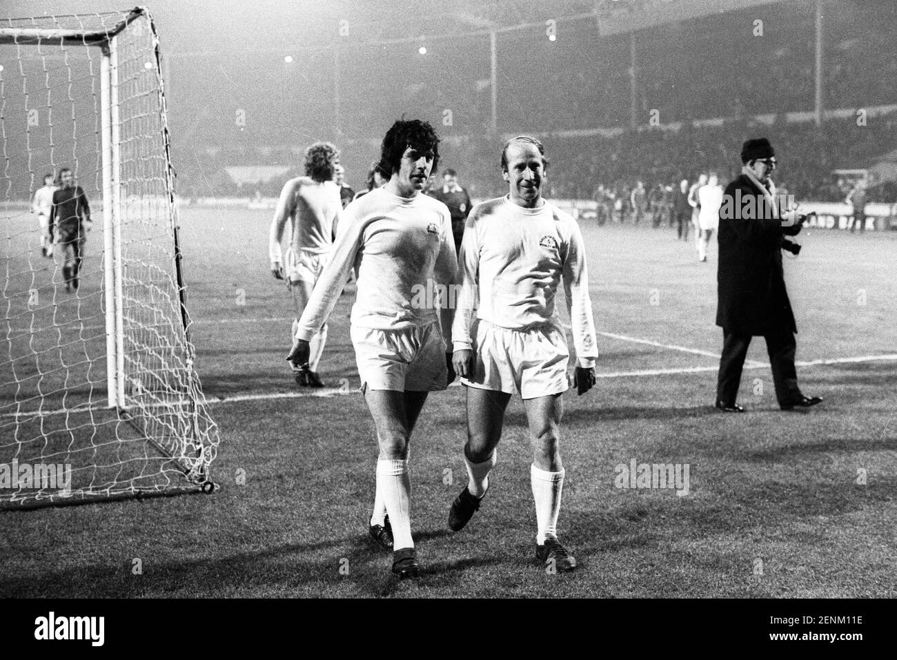 File photo dated 3-01-1973 of (L-R) Peter Lorimer and Bobby Charlton walk off the field after the match finishes. Issue date: Friday February 26, 2021. Stock Photo