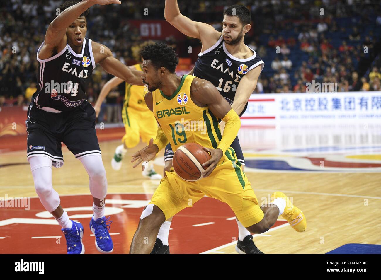 Greek professional basketball player for the Milwaukee Bucks of the  National Basketball Association (NBA) Giannis Antetokounmpo, left, tries to  get the ball at the second round of Group F Brazil vs Greece