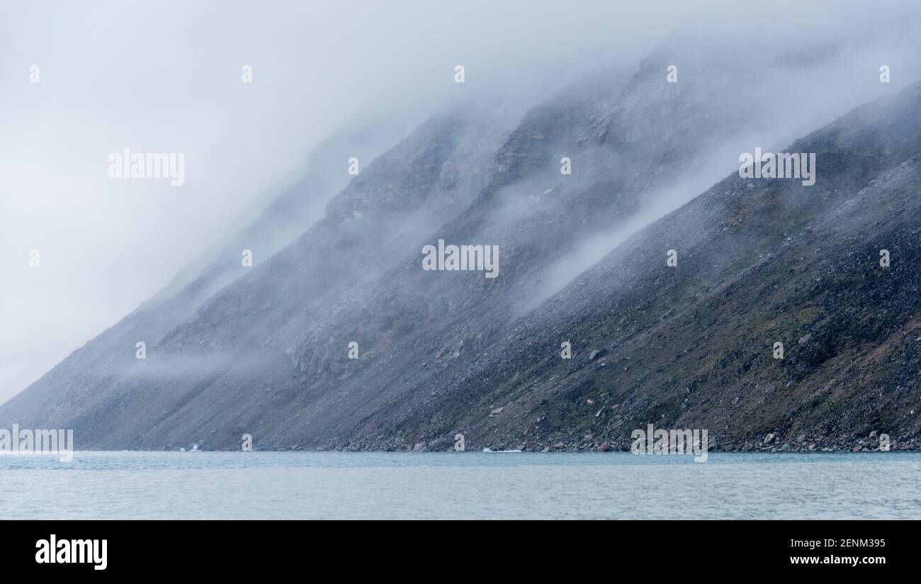 Low cloud and mist in Baffin Island fjord, Canada Stock Photo