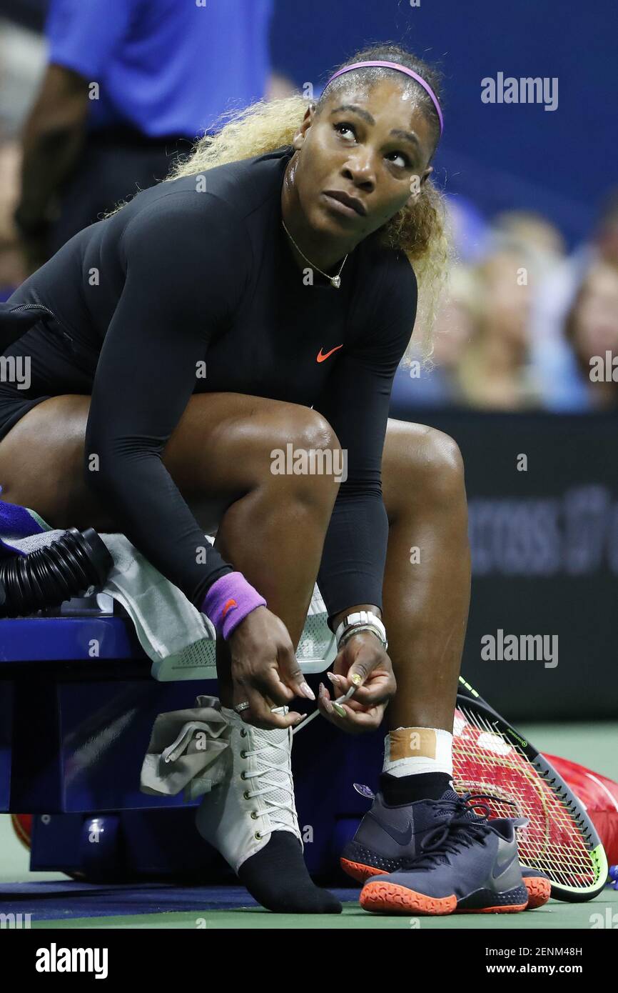 Sep 3 2019 Flushing Ny Usa Serena Williams Of The United States Ties An Ankle Brace During A Changeover Against Qiang Wang Of China Not Pictured In A Quarterfinal Match On Day