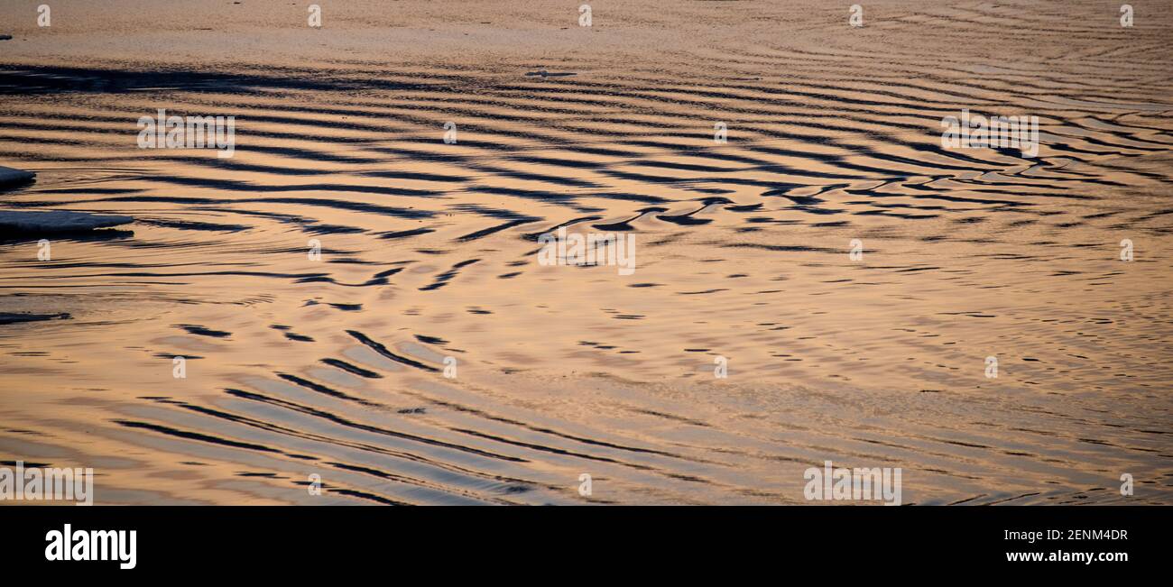 Sunset ship's wake of the Akademik Ioffe, Davis Strait, Baffin Island Stock Photo