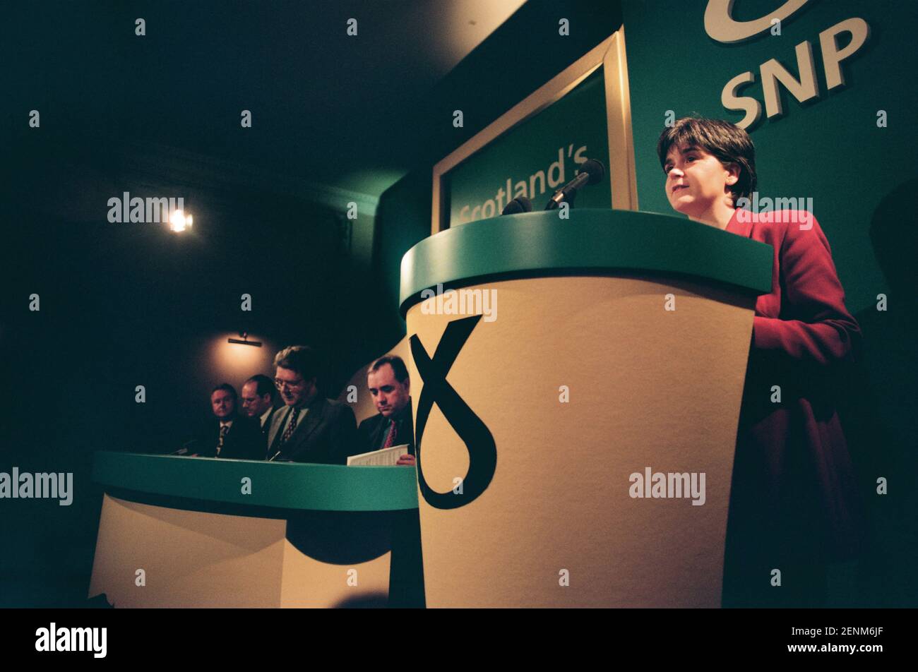 The Scottish National Party's Nicola Sturgeon addressing the media at the launch of the SNP's 1999 manifesto for the Holyrood election campaign in Edinburgh, Scotland, with party leader pictured to her right.. Ms Sturgeon was elected to the newly-created Scottish parliament in 1999 and went on to serve as the country's Deputy First Minister under Alex Salmond MSP and then as First Minister. At the time of the 1999 election she was working as a solicitor in the Drumchapel Law and Money Advice Centre in Glasgow. Stock Photo