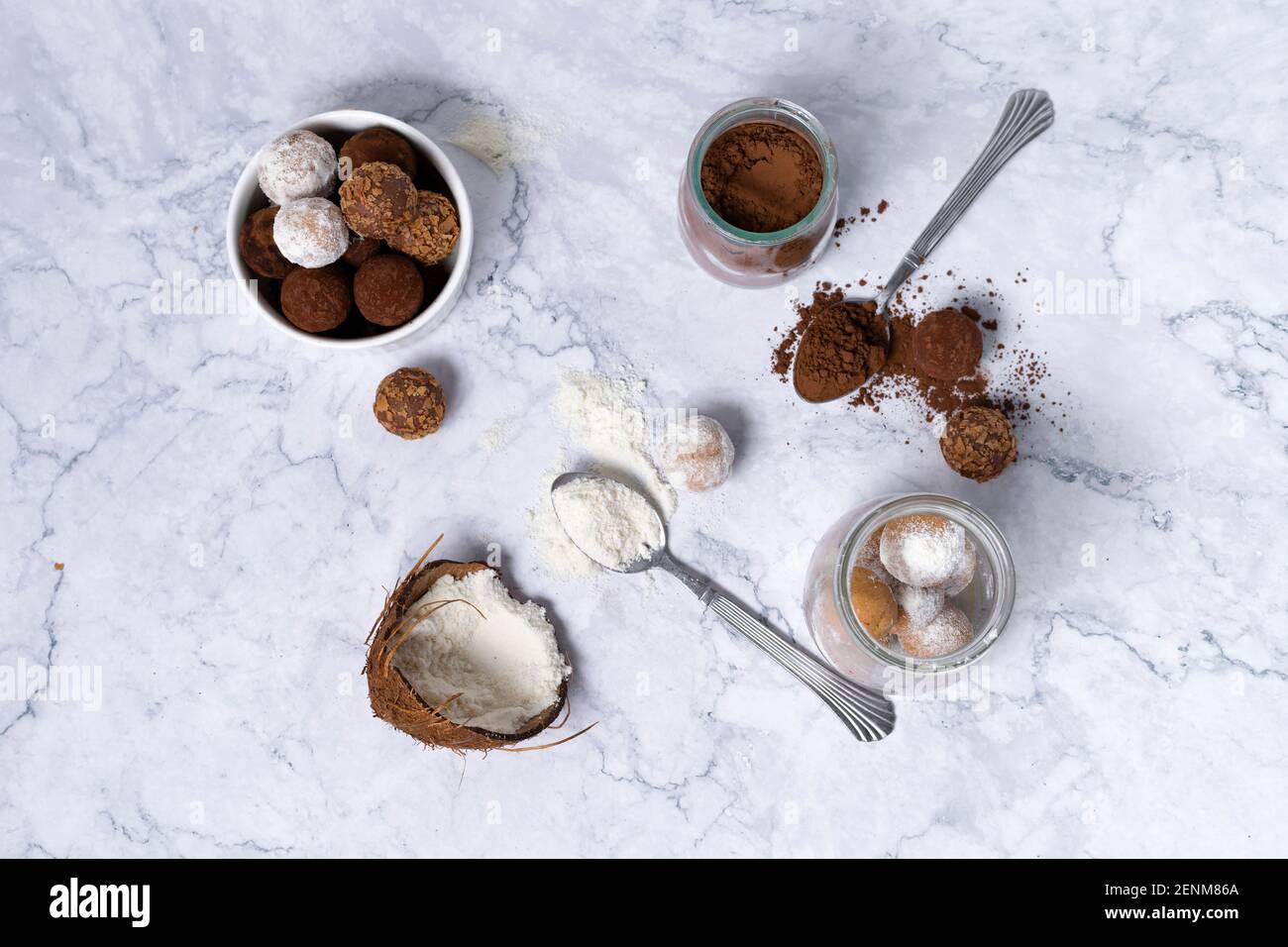 homemade energy balls - truffles made of cocoa and coconut shavings Stock Photo