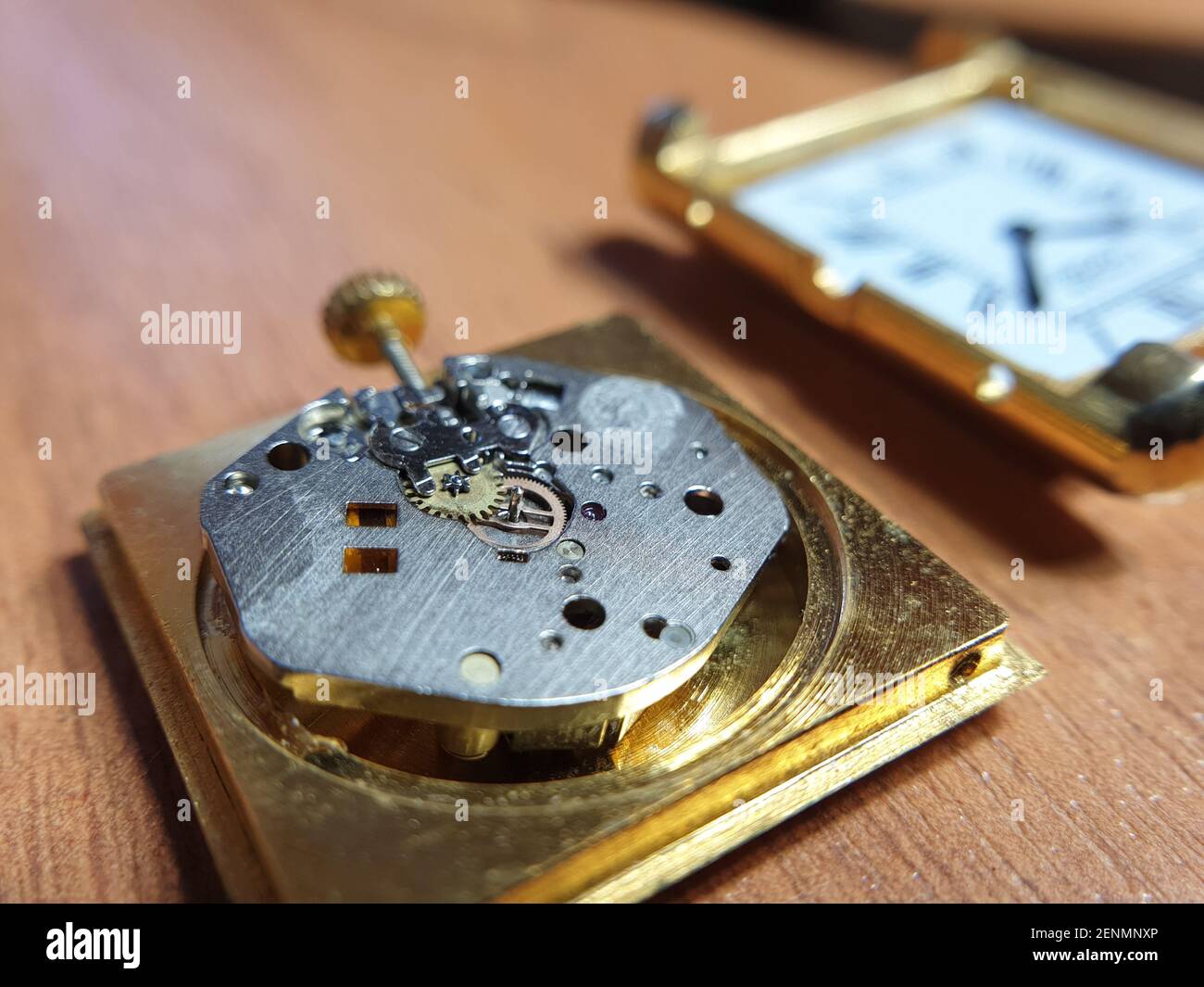 movement of a wristwatch closeup, repair of a broken watch Stock Photo