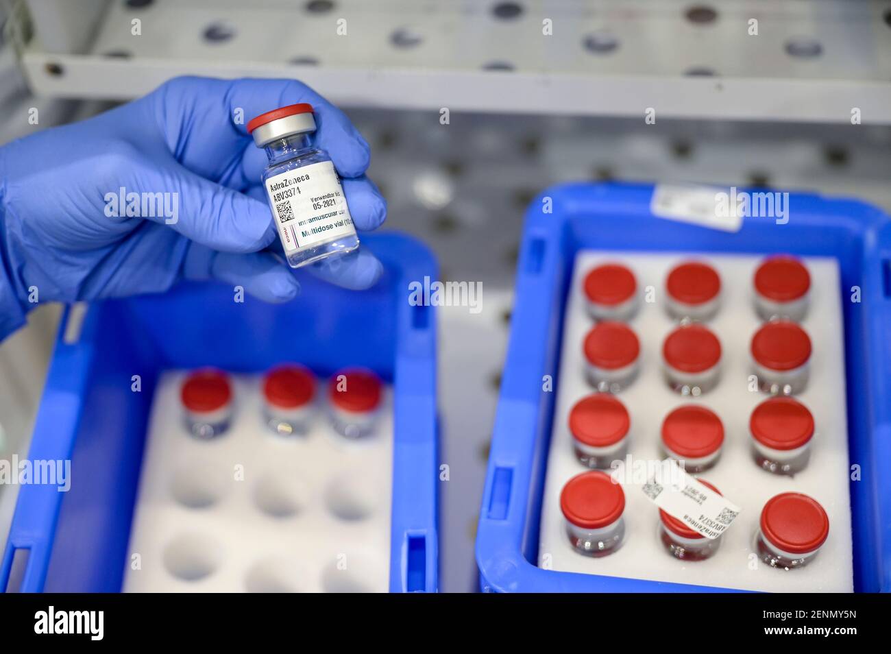 GERMANY, Hamburg, corona pandemic, largest vaccination center in Germany, for daily max 7000 people, logistics, cold storage, small glass vials with corona covid-19 vaccine of british swedish company AstraZeneca in refrigerator Stock Photo