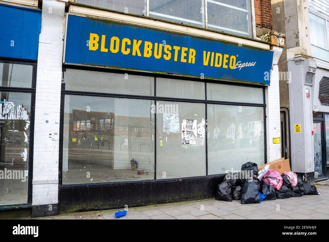 Blockbuster Video UK went into administration. Stores in the country were closed by Dec 2013. This in Westcliff on Sea, Essex still has sign. Decaying Stock Photo