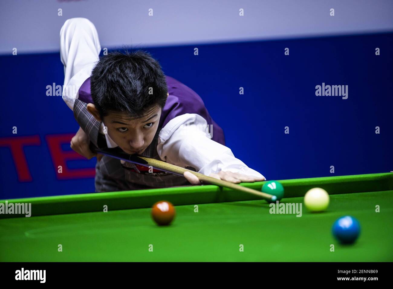 chinese professional snooker player wu yize plays a shot at the round 1 of 2019 snooker