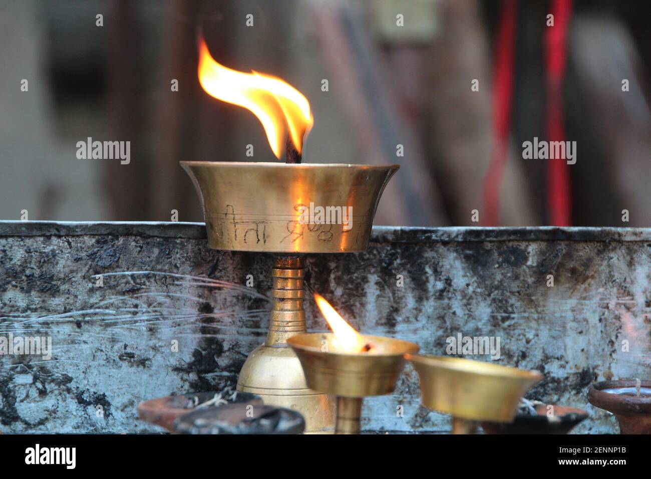 burning candles in a sacred hindu tempel of varanasi near the river ganges Stock Photo