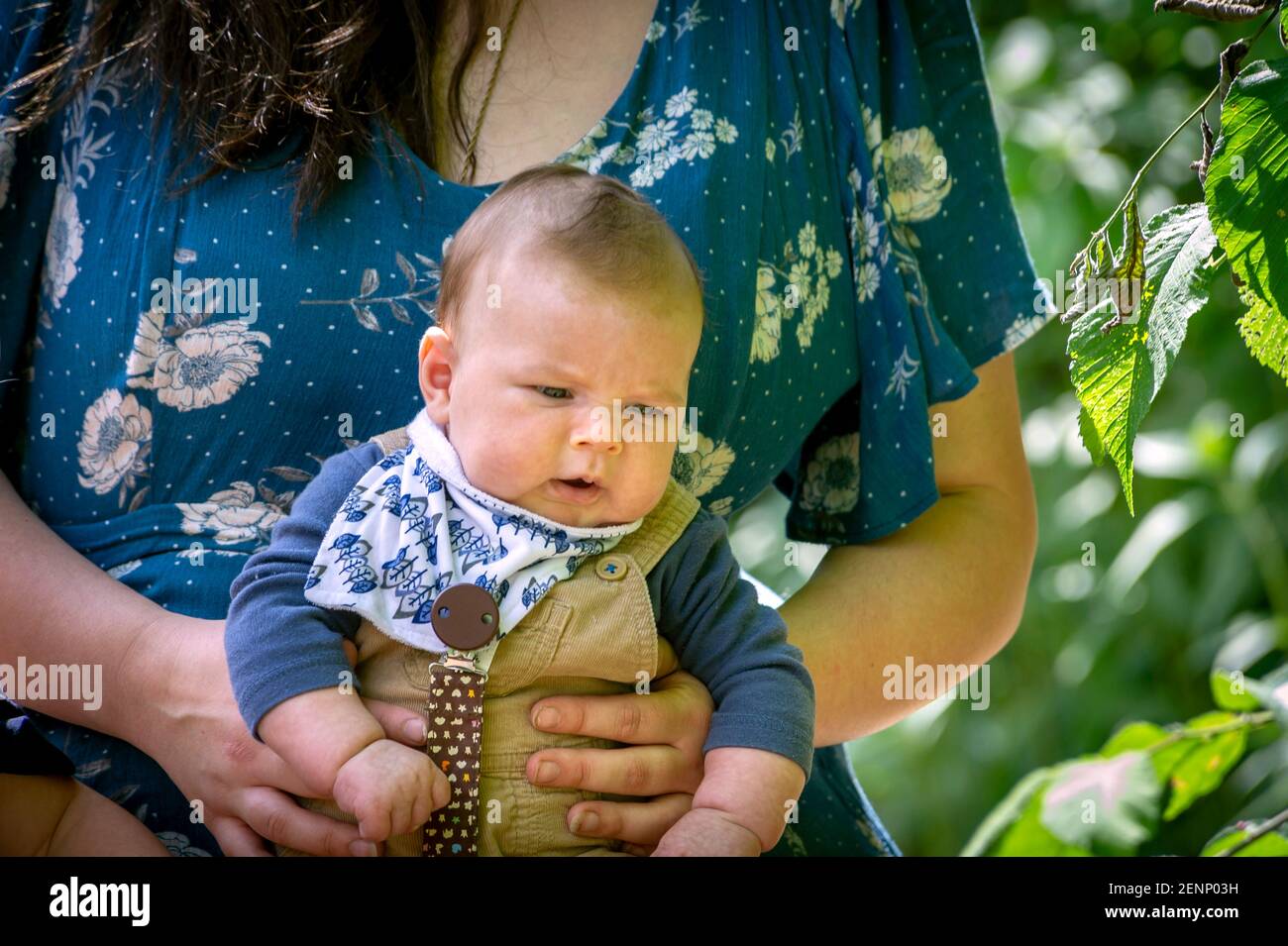 Portrait of a 2 months old boy with his mother Stock Photo