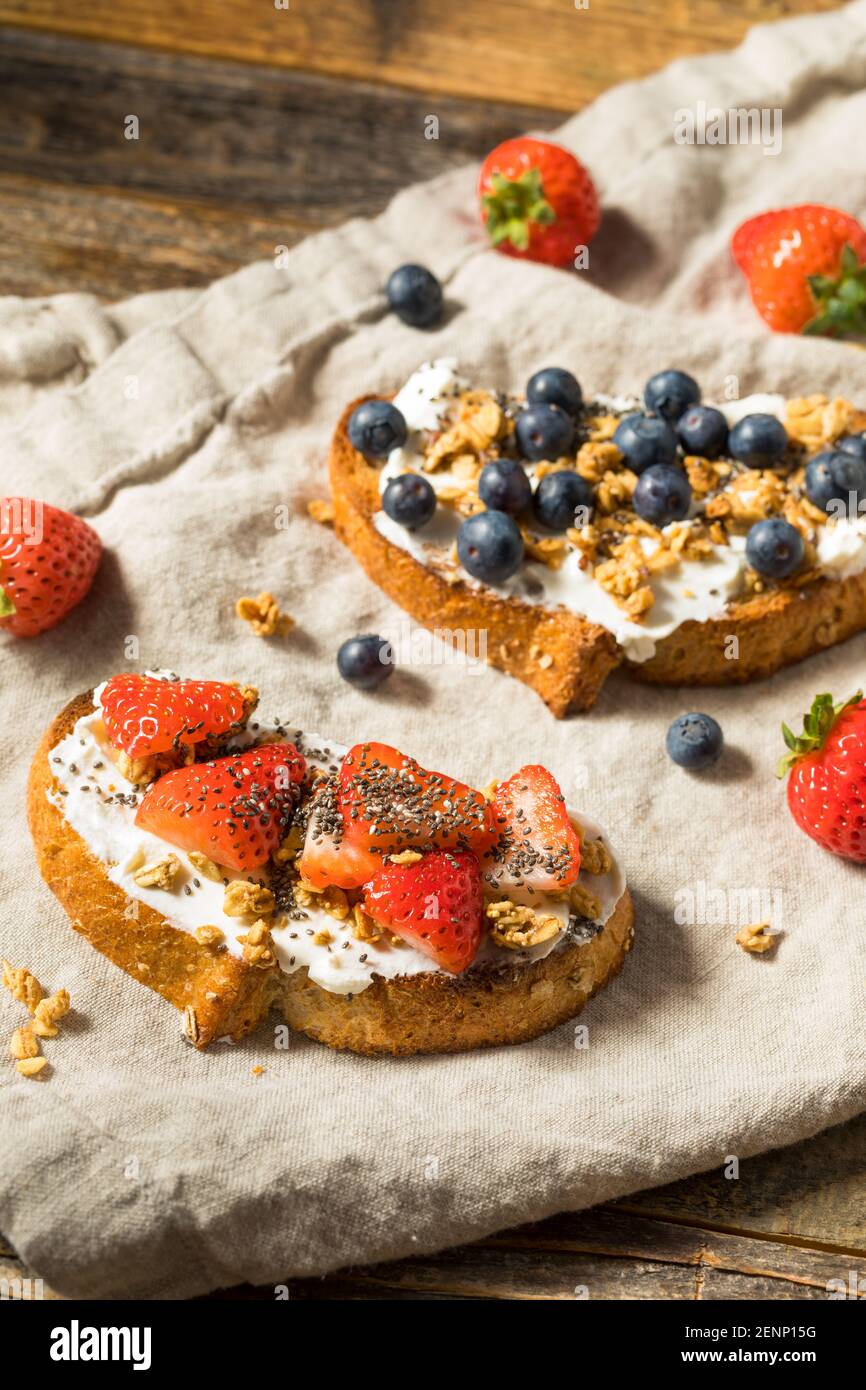 Healthy Organic Ricotta Cheese Breakfast Toasts with Granola and