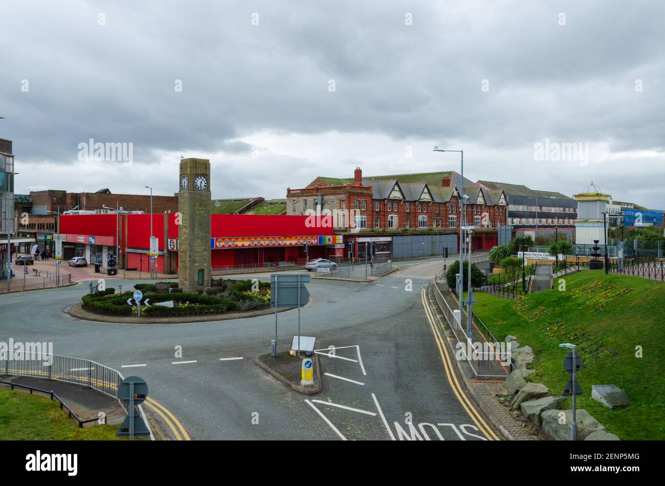 Rhyl, Denbighshire; UK: Feb 21, 2021: A general street scene showing  the clock tower roundabout with the soon to be demolished and redeveloped Queens Stock Photo