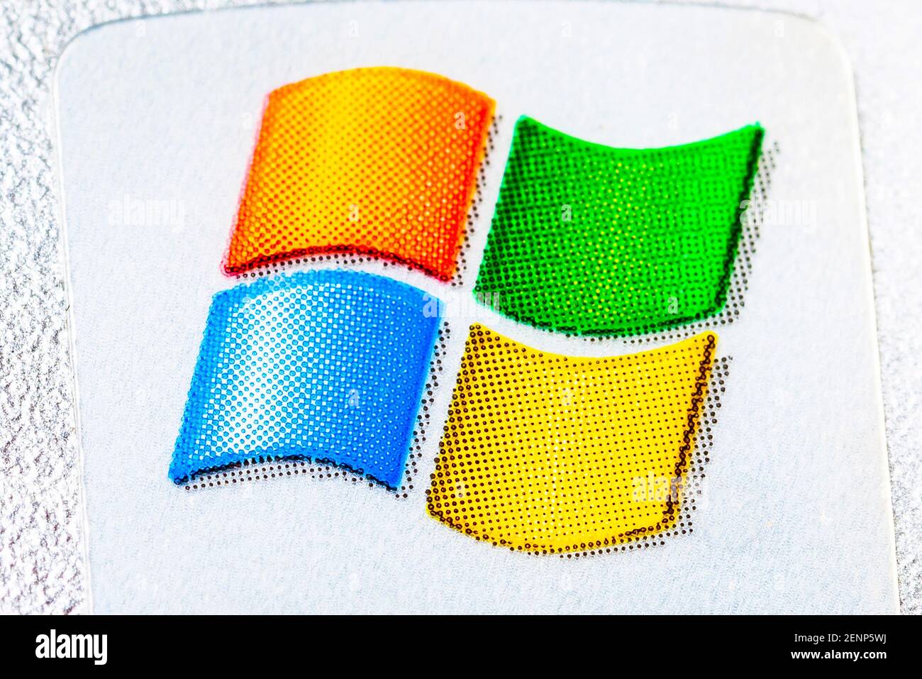 Microsoft Windows XP, Windows 7 operating system logo, brand symbol sticker label macro, extreme closeup, detail. Old, outdated OS safety concept, nob Stock Photo