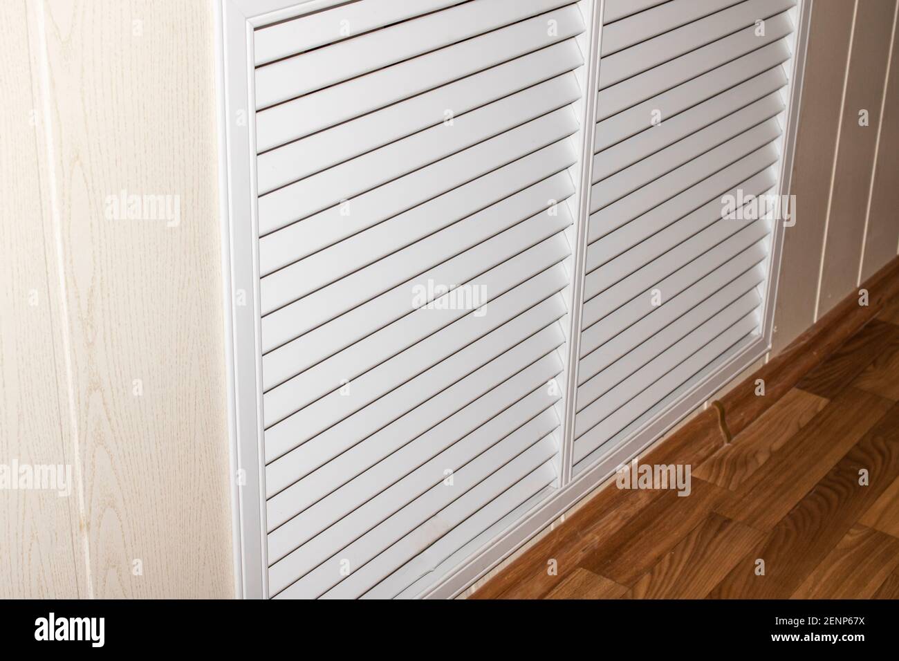White radiator grill on the wall close up Stock Photo - Alamy