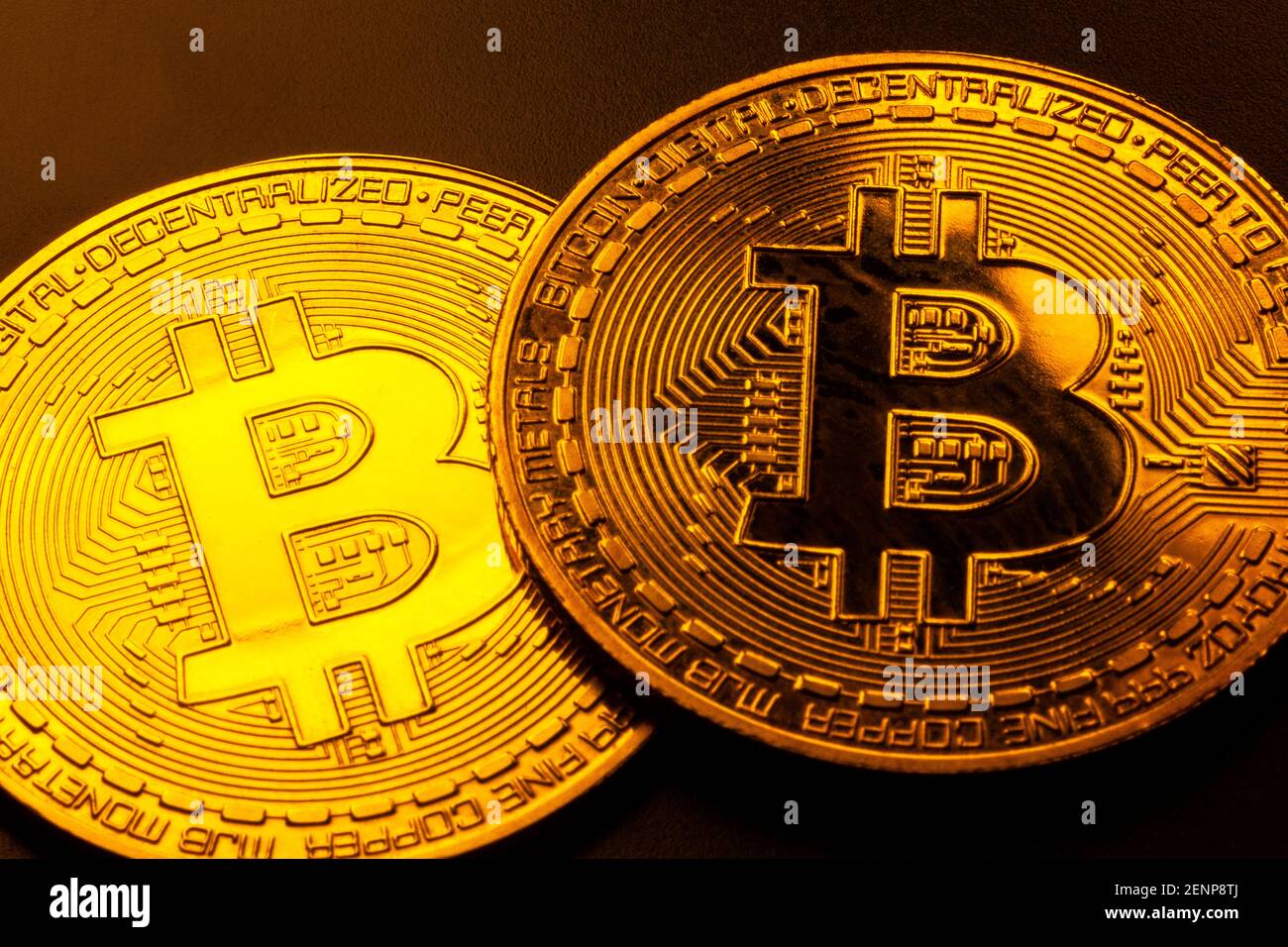 Two shiny gold bitcoin coins macro, extreme closeup. Golden cryptocurrency  symbol up close, decentralized finance, digital assets wealth, bitcoin cryp  Stock Photo - Alamy
