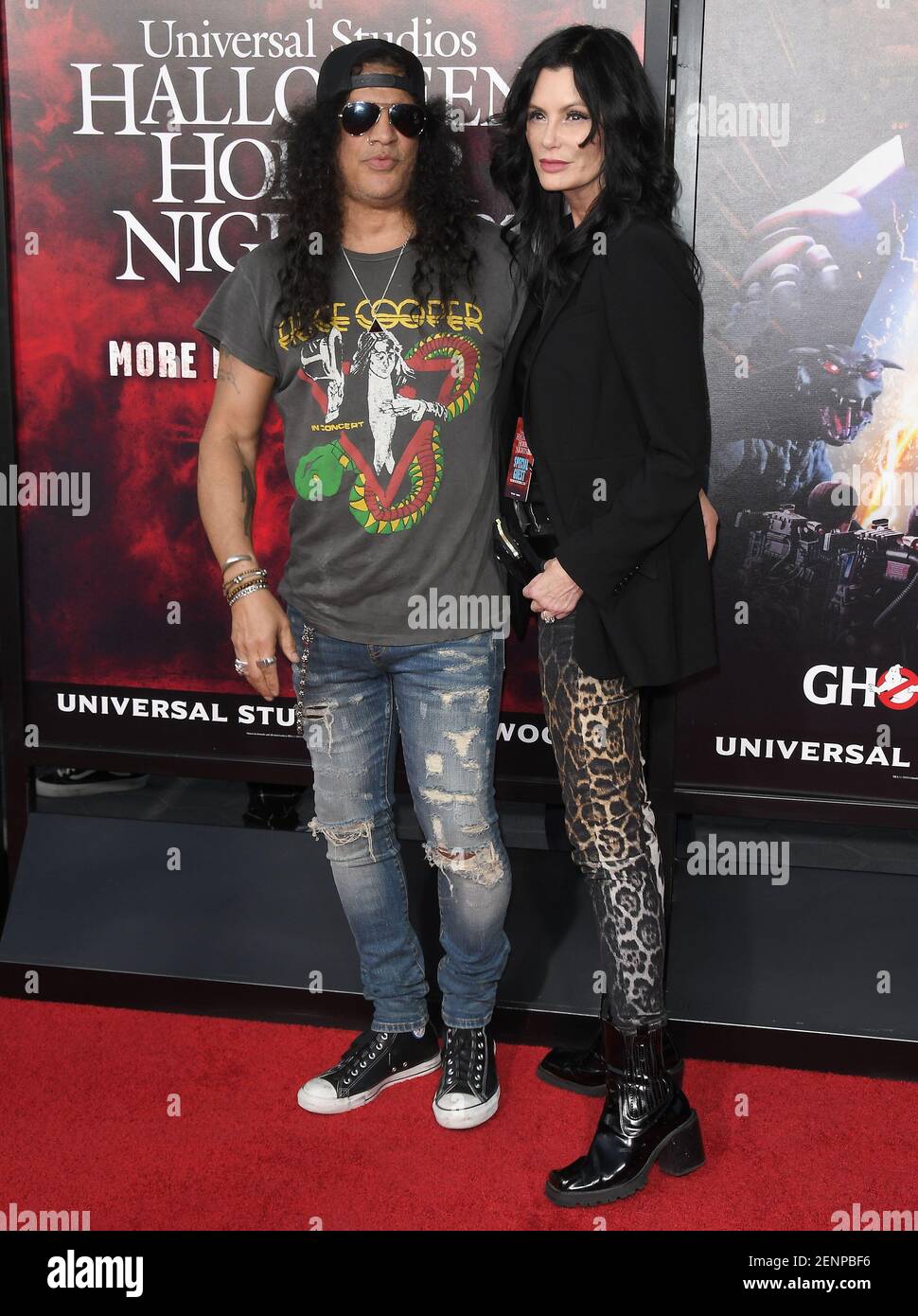 (L-R) Slash and Meegan Hodges arrives at the Opening Night of Universal